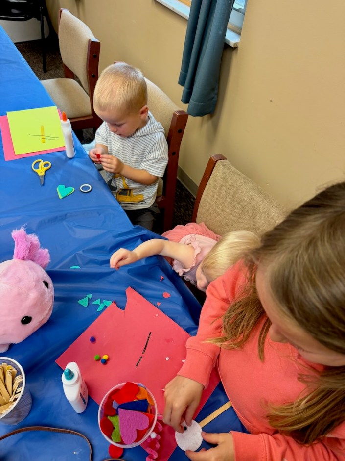 Kids doing crafts at the library