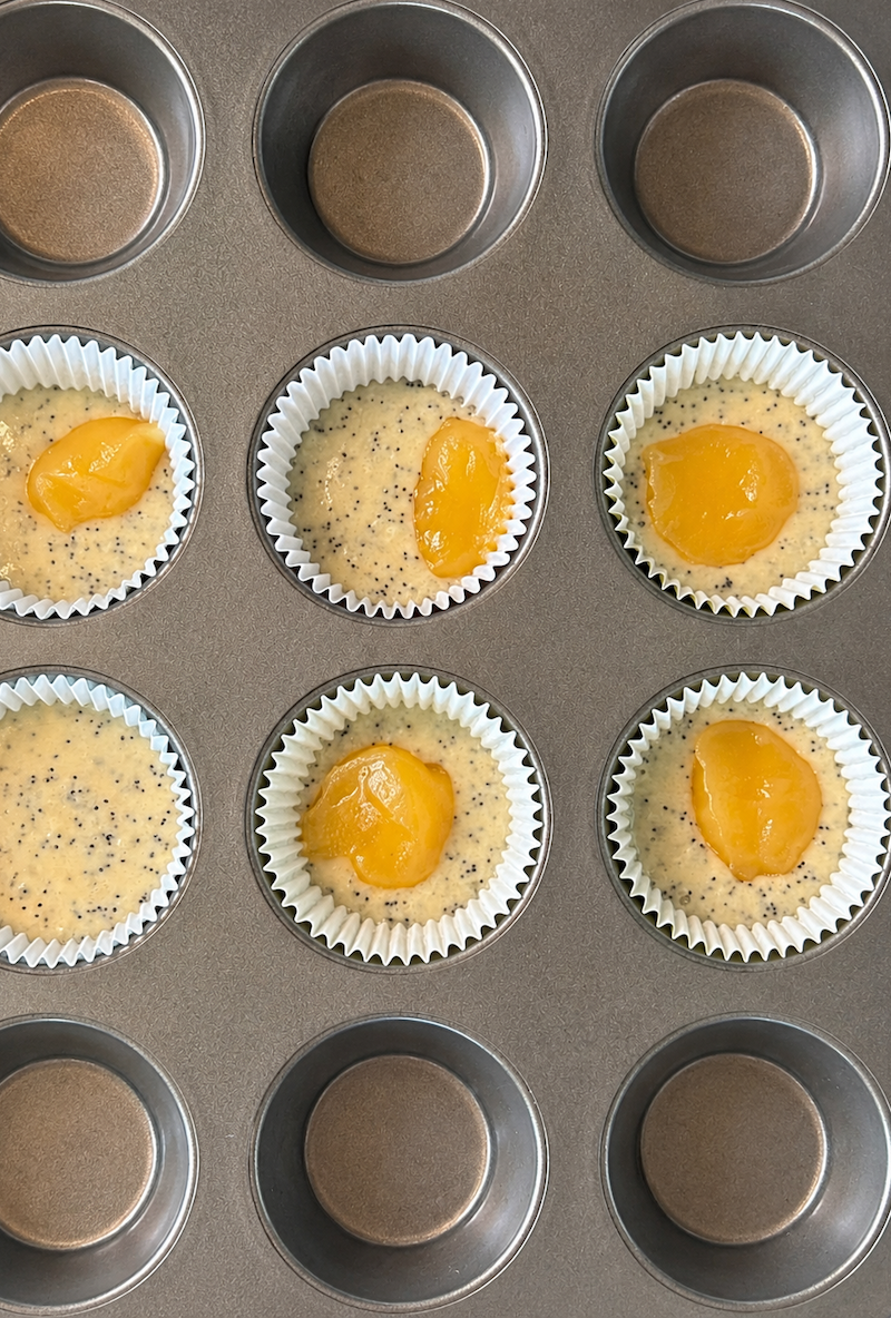 Lemon poppy seed muffins with lemon curd
