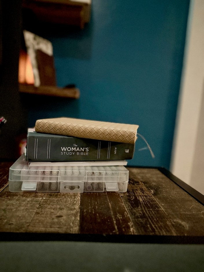 Women's Study Bible and journal sitting on coffee table