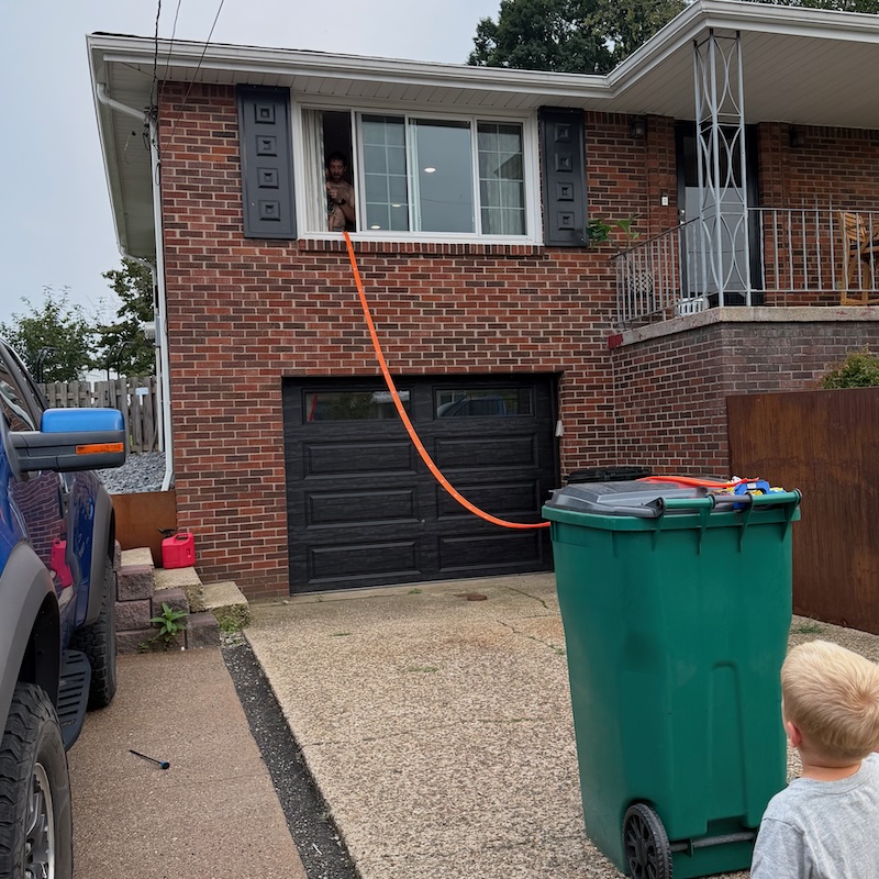 Hot Wheels track from house to garbage can