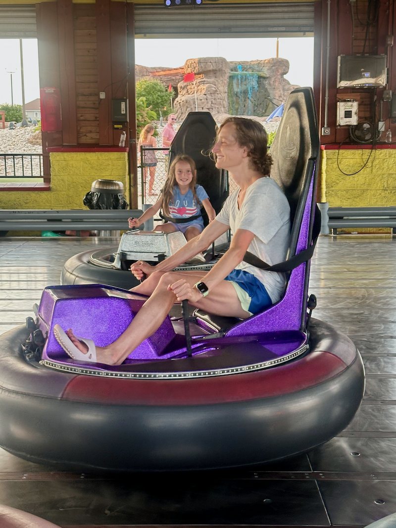 Mom and daughter doing bumper cars