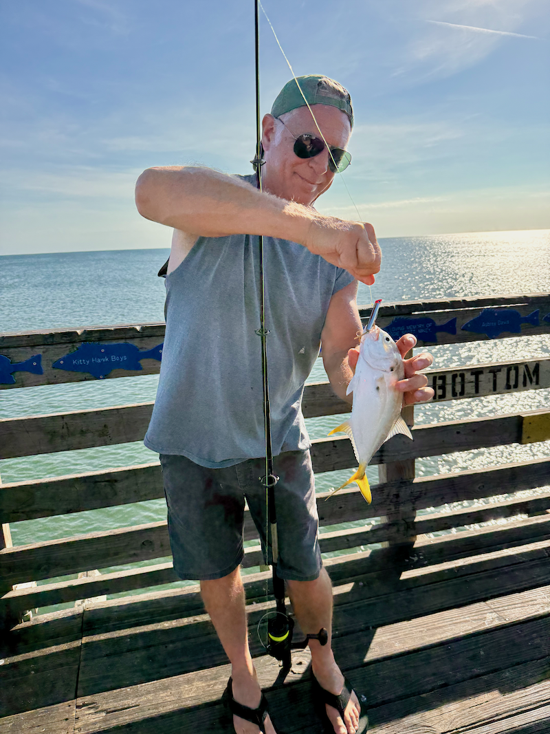 Guy with fish on Avalon Pier
