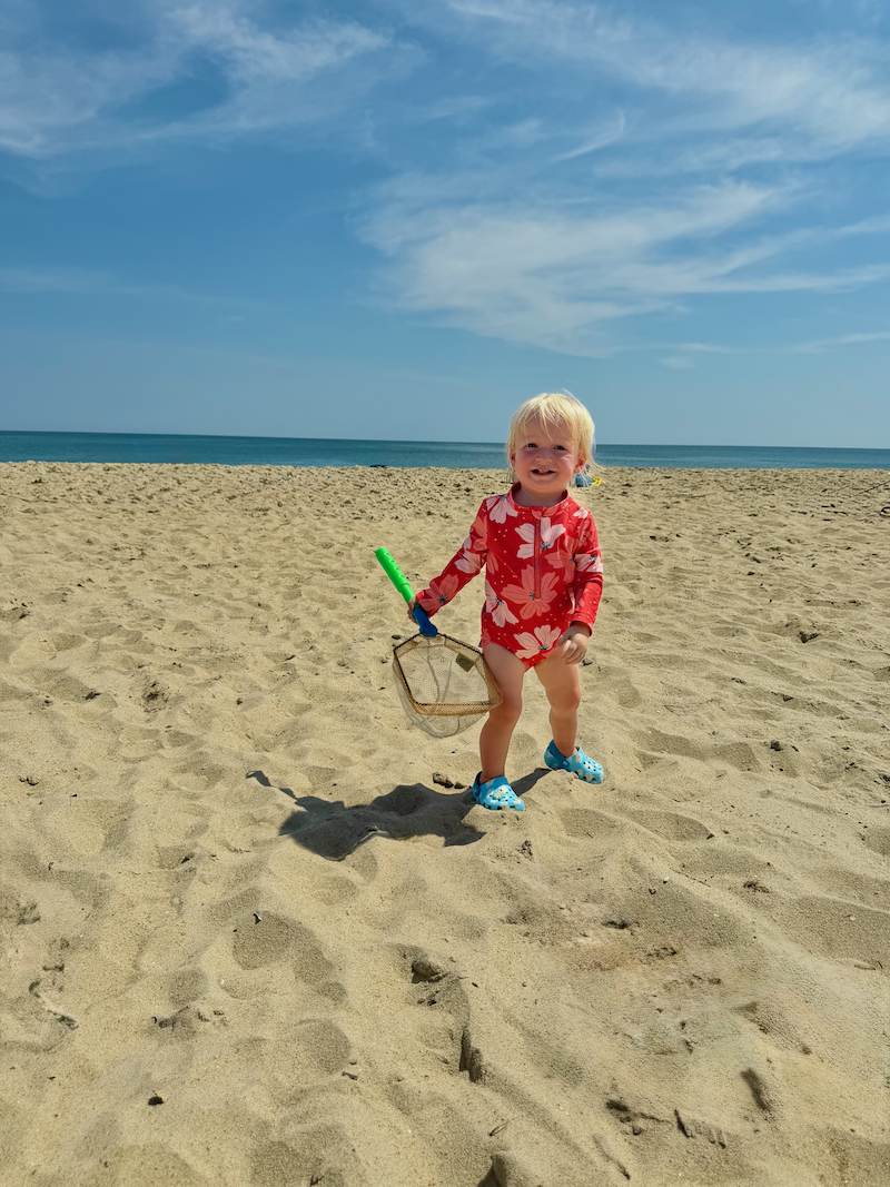 Toddler girl on the beach