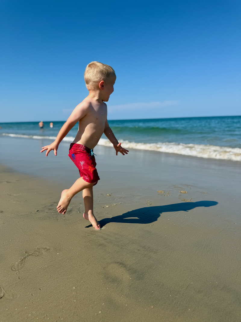 Toddler boy on beach in Outer Banks, NC