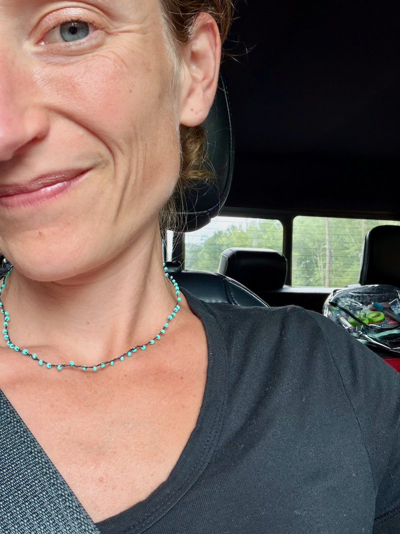 Selfie of girl smiling in the car