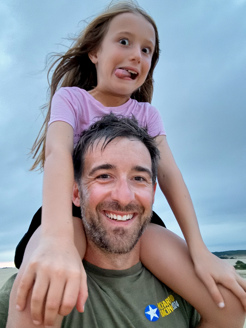 Dad with daughter on his shoulders