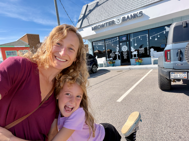 Mom and daughter at Meowter Banks Cat Cafe in Kill Devil Hills, NC