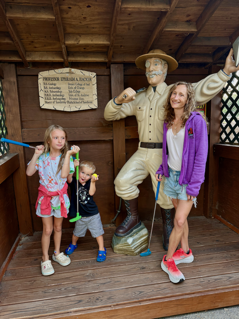 Mom and kids at Professor Hacker's Mini Golf in Kill Devil Hills