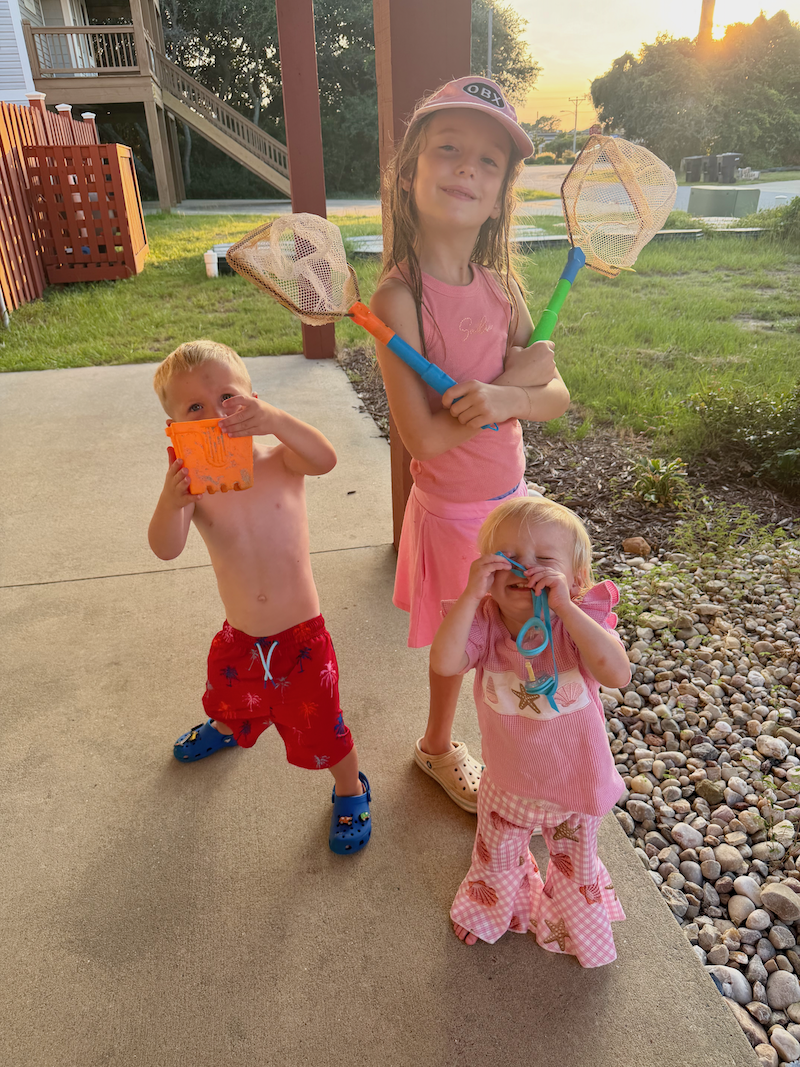 Kids outside with beach toys